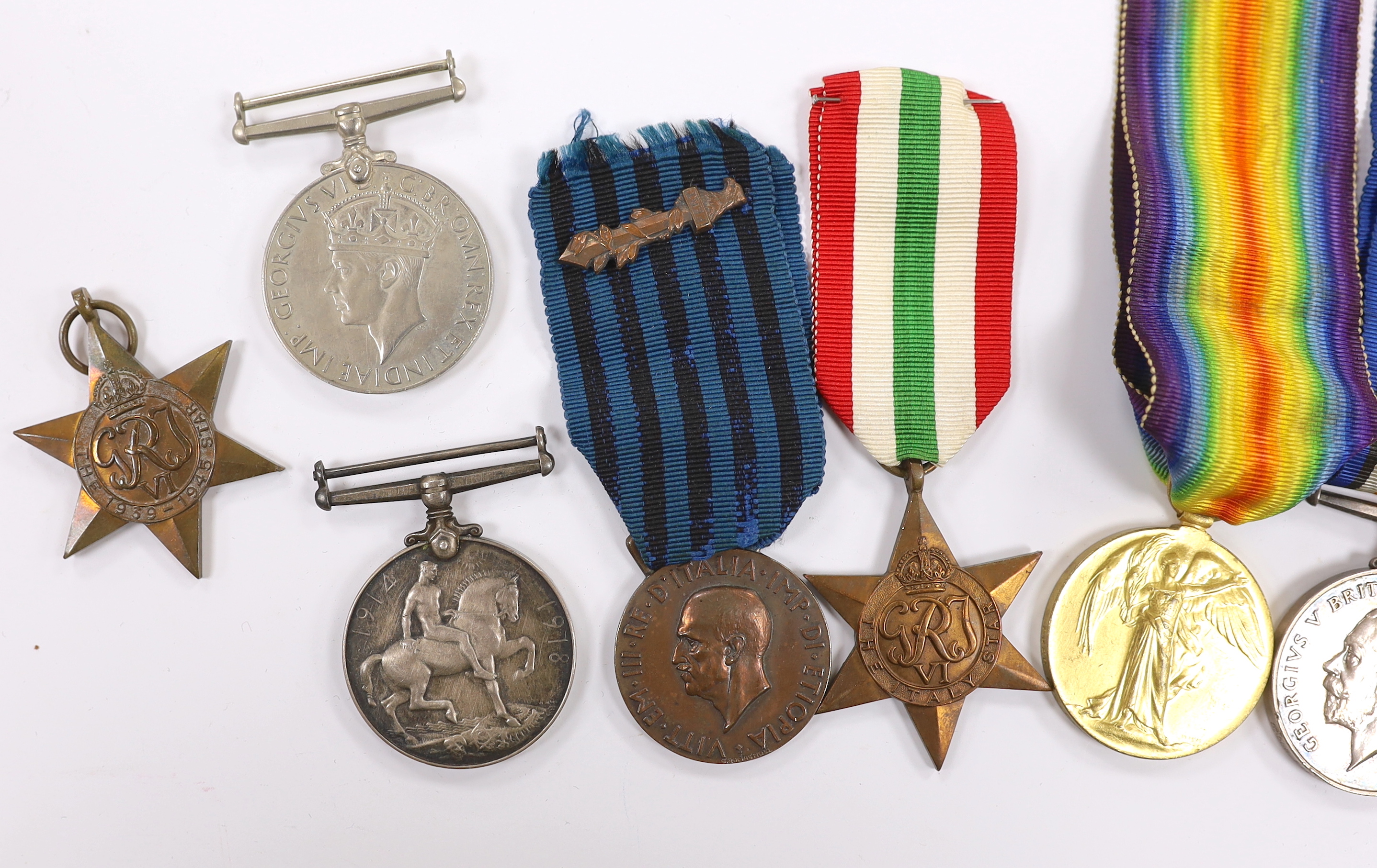 Ten medals; two First World War pairs of the Victory medal and the British War medal to Pte. F.J. Pulham 24 London Reg. and Pte. H. Cannell M.G.C., three WWII medals; The Italy Star, The 1939-1945 Star and a 1939-1945 Wa